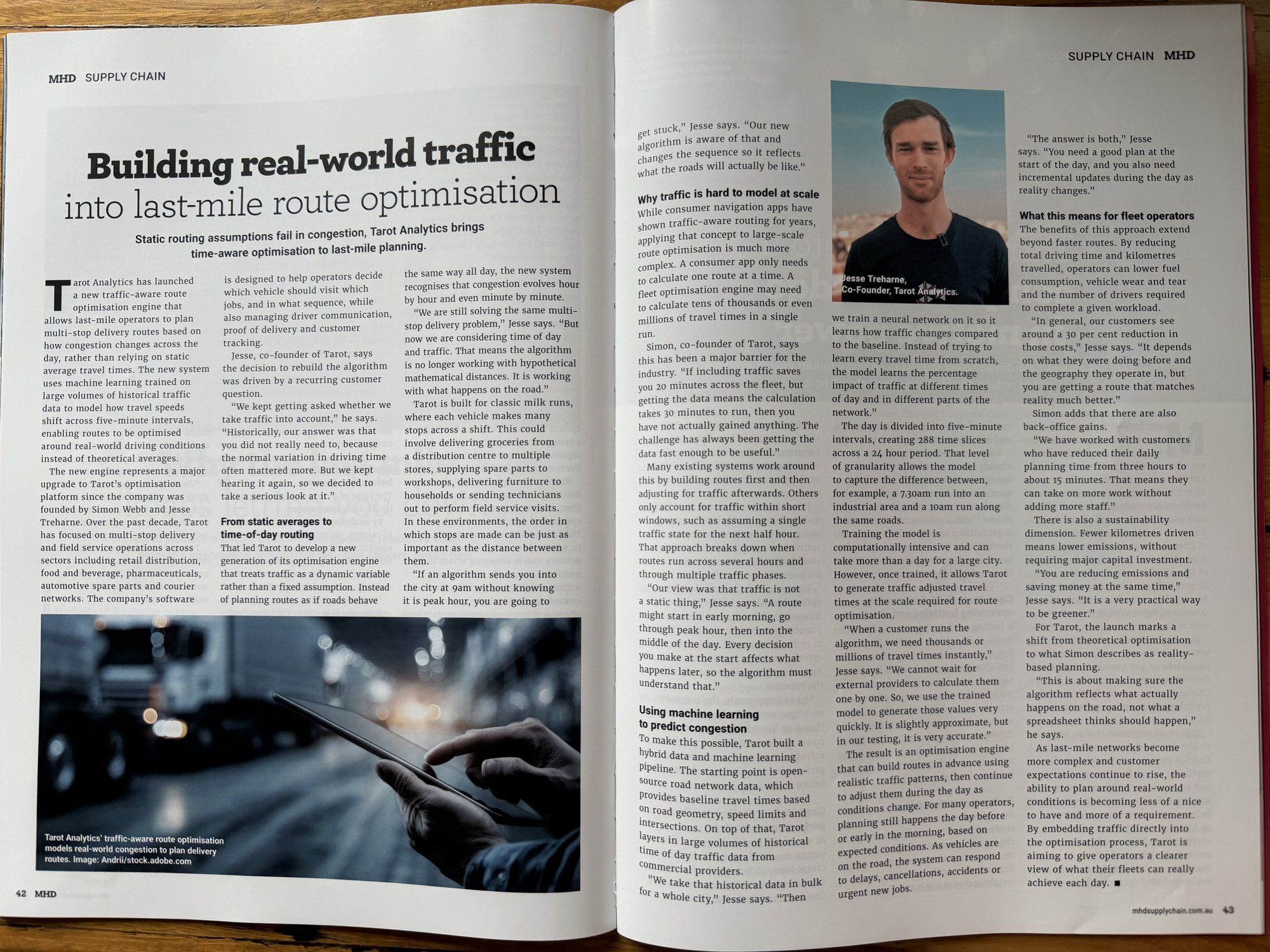 Double-page spread of MHD Supply Chain magazine featuring an article on traffic aware route optimisation in last mile delivery.